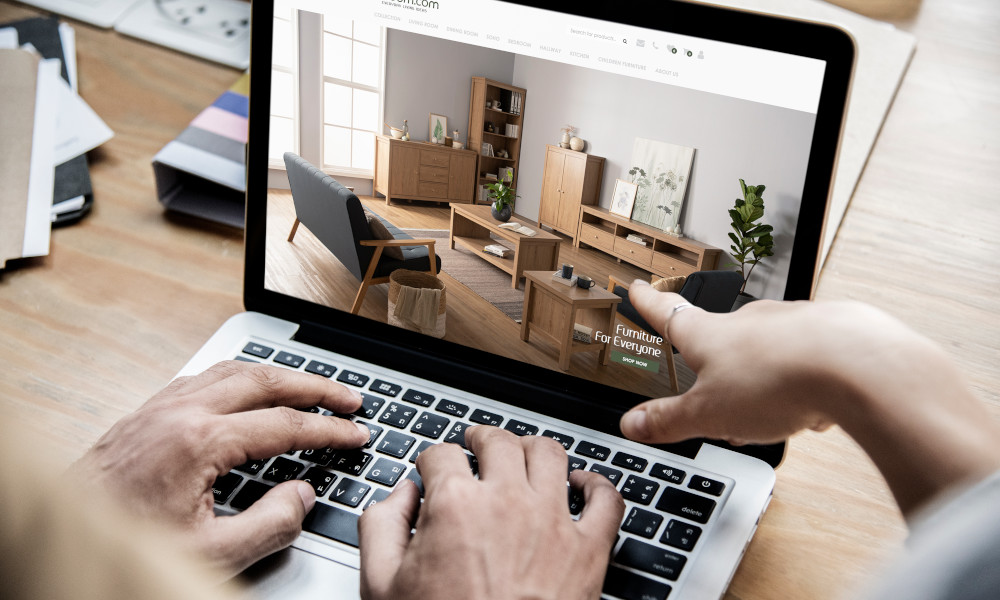 A woman is pointing out her finger to online furniture store in Malaysia.